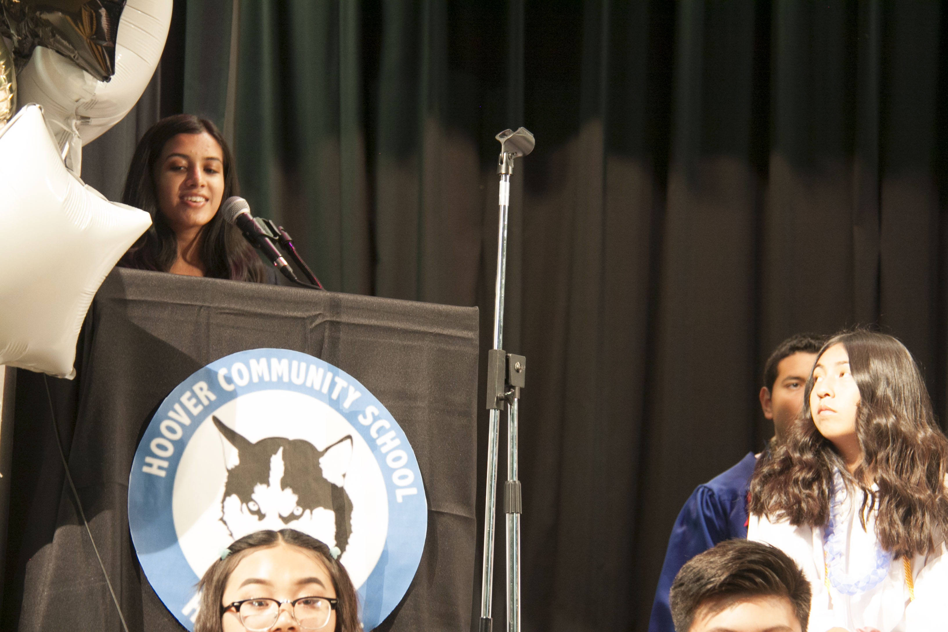 Shriya Jain presenting awards at Hoover